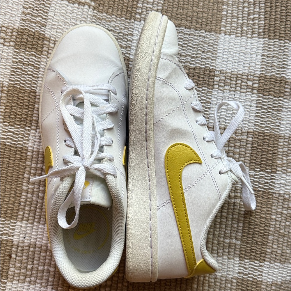 Nike White Sneakers with Yellow Swoosh